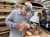 Man working with wood in a workshop