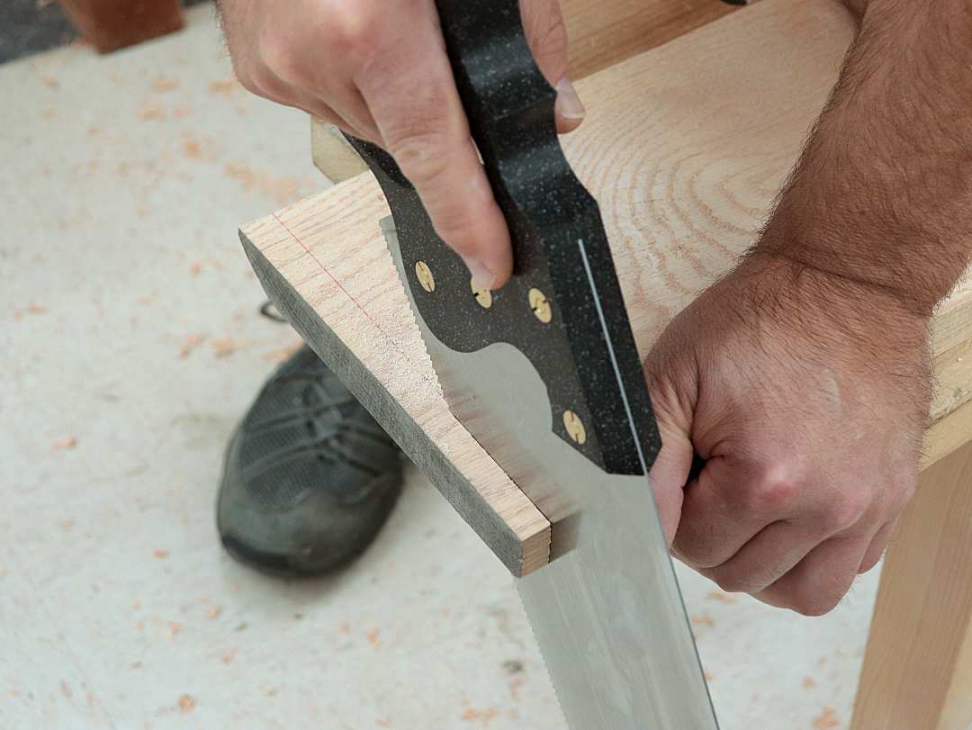 Cutting with a crosscut saw