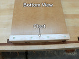 Bottom view of a Rob Cosman shooting board showing the cleat