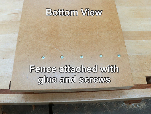 Bottom view of a Rob Cosman shooting board showing how the fence is attached