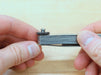 Feeler gauge locking nut